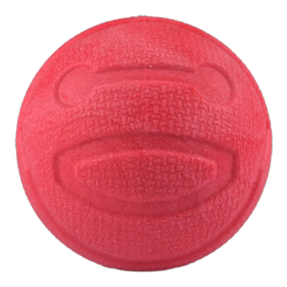 Pelota para perros con aroma a fresa y textura sensorial en vista frontal