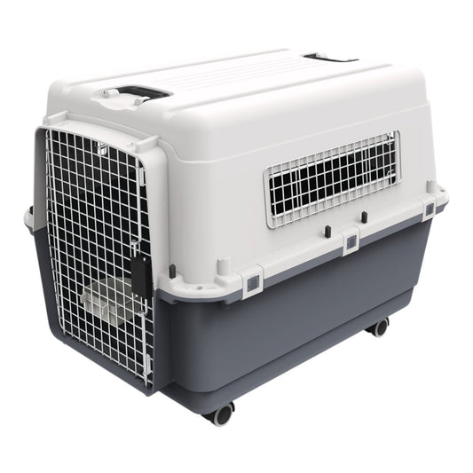 Transportadora kennel rígida color gris con puerta metálica, ruedas y ventilaciones laterales, ideal para perros de hasta 25 kg
