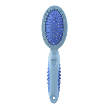 Acercamiento a las púas de acero del cepillo dual azul, diseñadas para eliminar nudos y pelo muerto de forma efectiva, en Kamalitas.