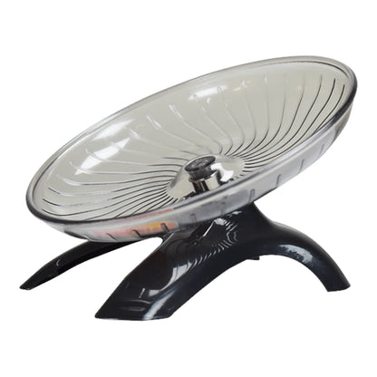 Vista lateral en ángulo del disco ejercitador original de la marca Dayang para hámster, mostrando la inclinación ergonómica y base negra estable que cuida su columna, en Kamalitas.