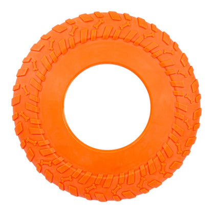Disco volador de caucho flexible color naranja brillante, diseñado para alta visibilidad y durabilidad en el juego.