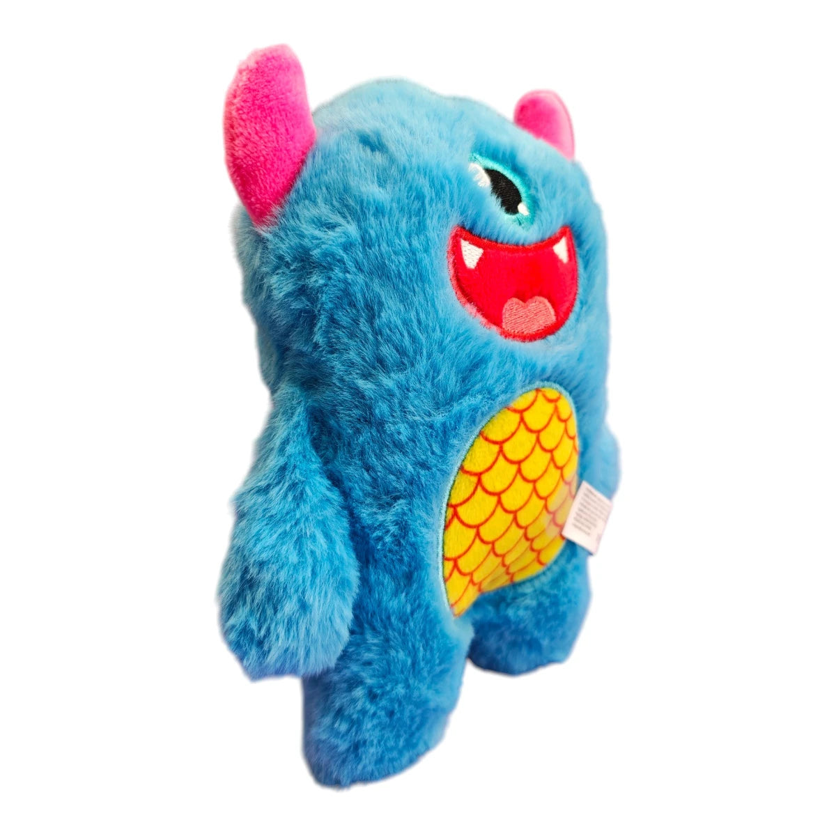 Vista de perfil del peluche para perro Monster Blue de 22 cm de largo, mostrando su cuerpo suave y compacto para fácil agarre, en Kamalitas.