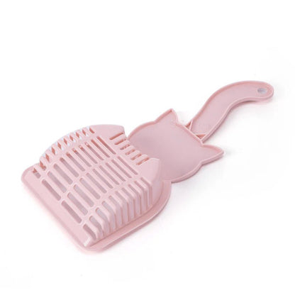 Vista trasera de la Pala de Arenero para Gatos Diseño Gatito en color rosa, mostrando  su sistema de rejilla para separar la arena, en Kamalitas.