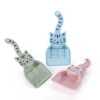Imagen de uso de la Pala de Arenero para Gatos Diseño Gatito mostrandoo sus tres colores disponibles, azul cielo, verde olivio y rosa.