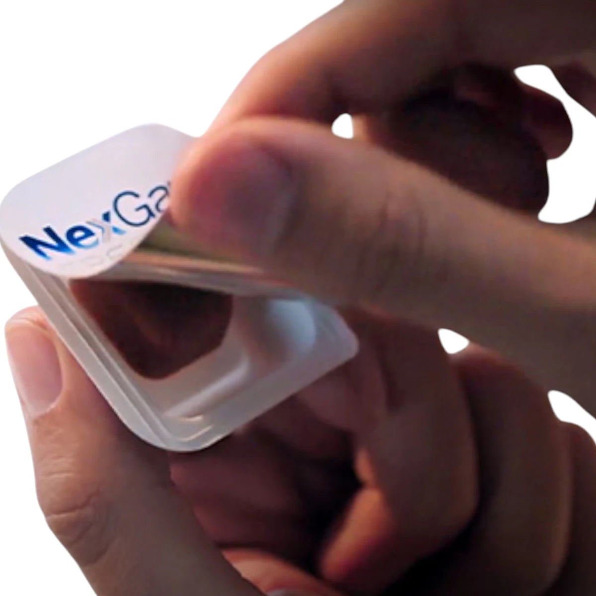 Detalle de la apertura del blister de NexGard Spectra mostrando la forma y tamaño de la tableta masticable.